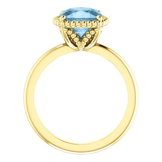 14KT GOLD 1 1/4 CT SKY BLUE TOPAZ BEADED SOLITAIRE RING