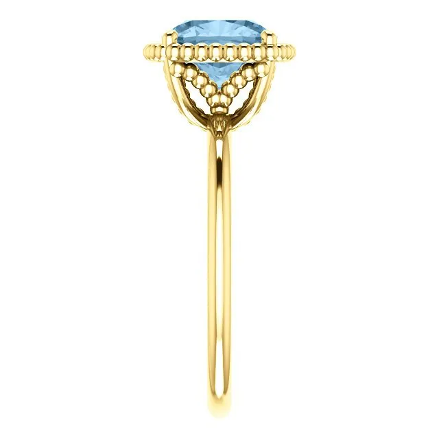 14KT GOLD 1 1/4 CT SKY BLUE TOPAZ BEADED SOLITAIRE RING